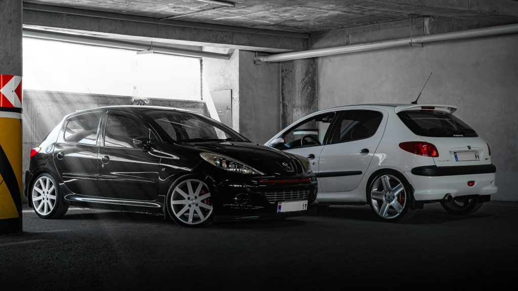 cars in dramatic sunlight beam