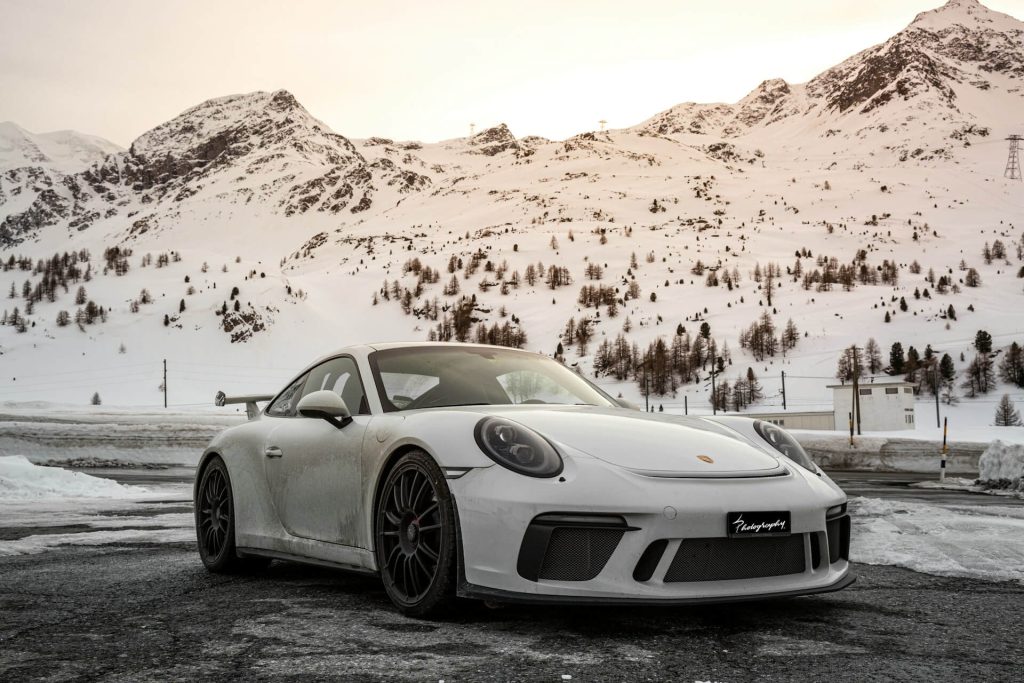 white porsche in mountains